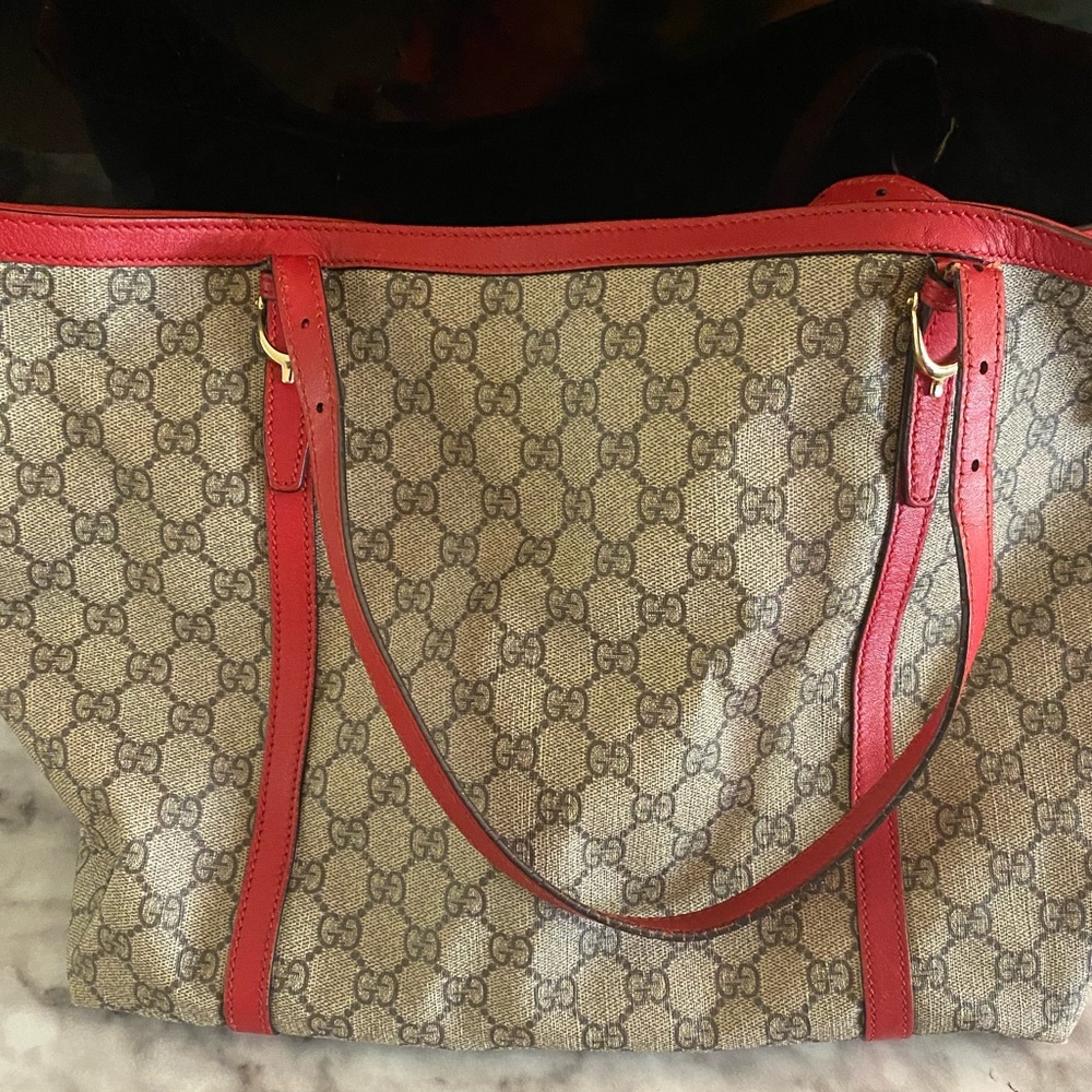 Gucci bag along with gucci wallet